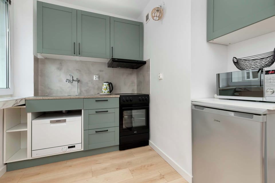 The fully equipped kitchenette includes everything you need for a home-cooked meal.
