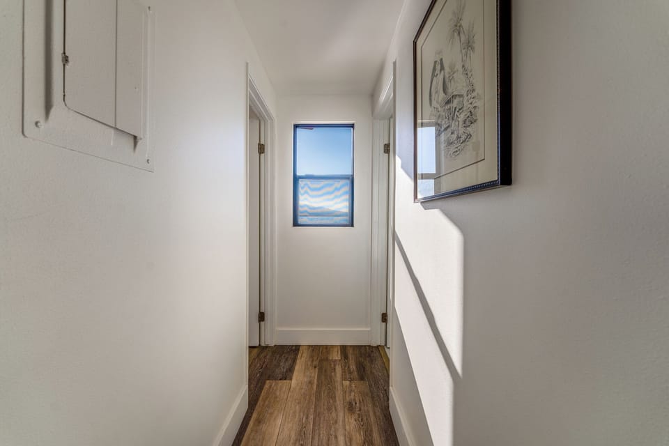 Hono Kai B4-Hallway to guest bedroom and bathroom with ocean views