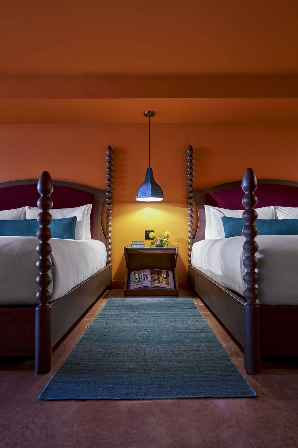 Drift off in crisp linens framed by bold, playful design.