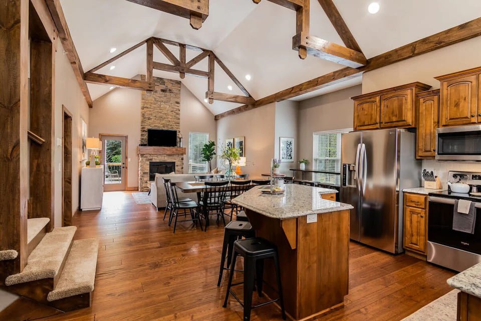 Room for everybody.  Open concept kitchen, dining, and living room.