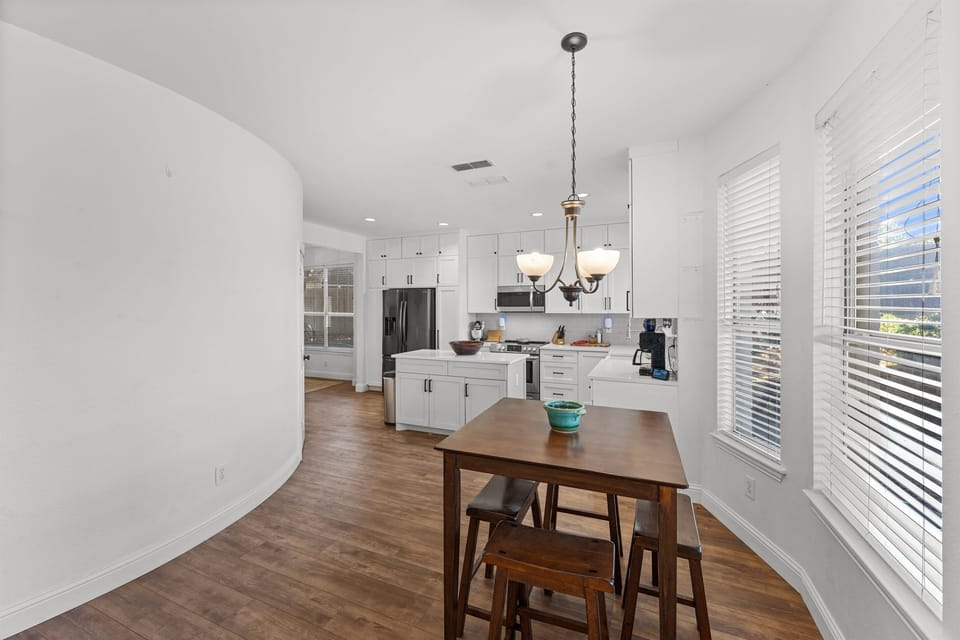 A bright, cozy corner perfect for morning coffee or casual bites.