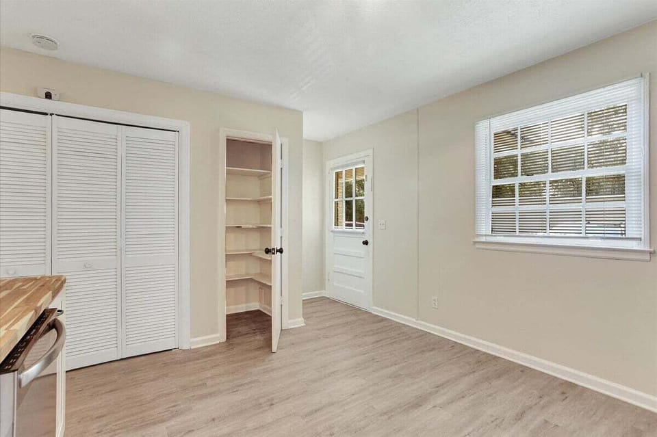 Step out with ease! The kitchen opens directly to the rear parking, blending convenience with functionality