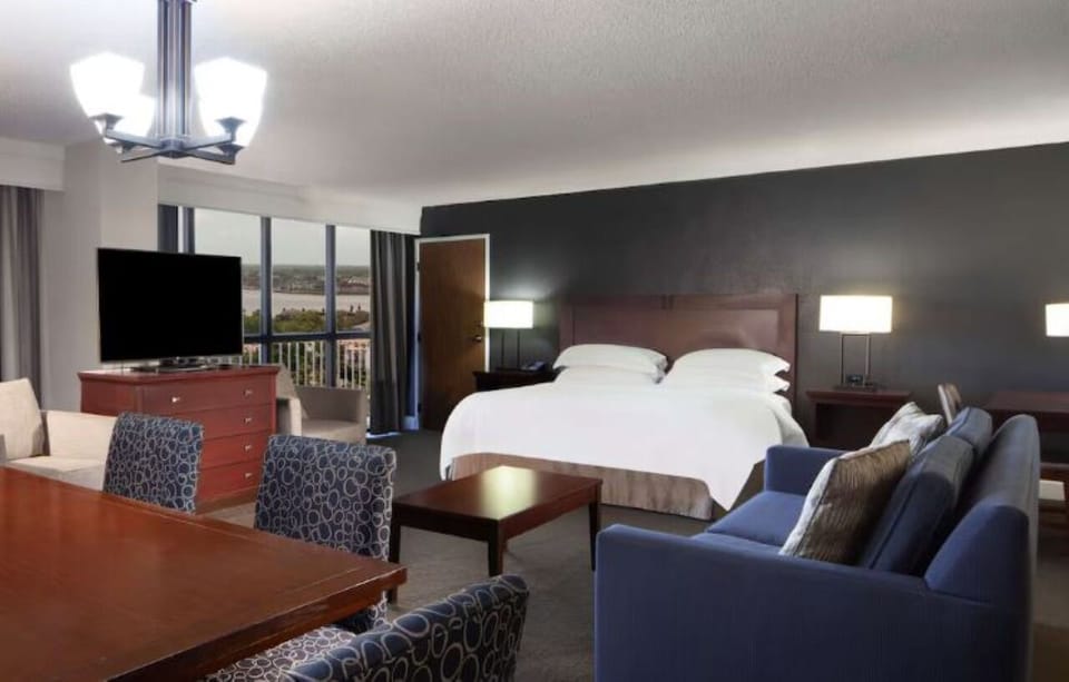 Unwind in a spacious suite with comfy seating and views.