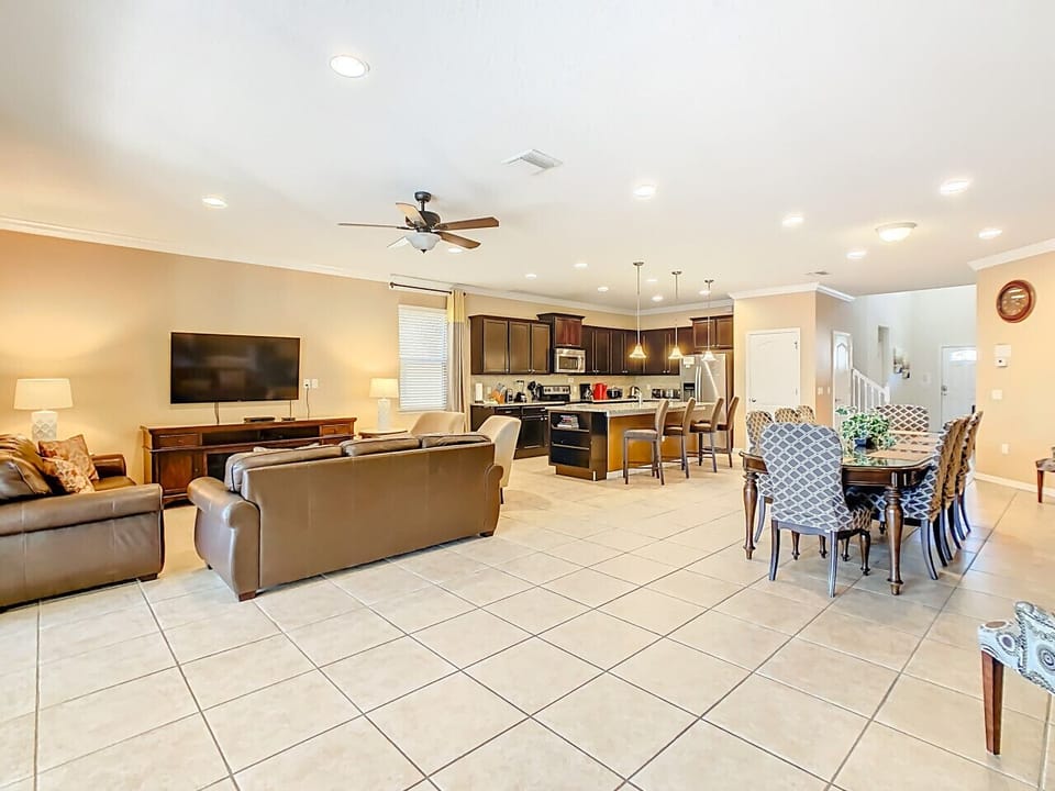 Spacious open-concept living, dining, and kitchen area—perfect for gathering and relaxing together.