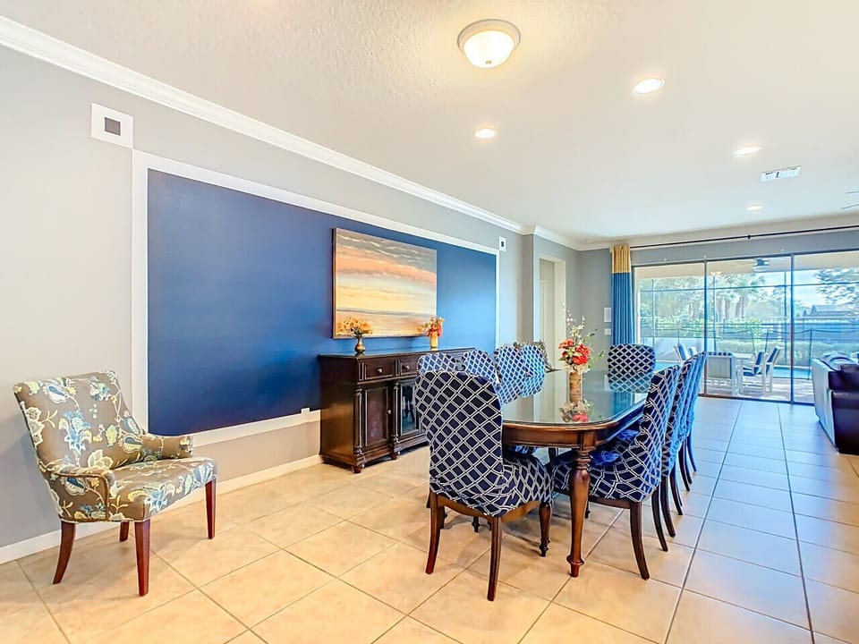 Enjoy meals in the dining area, complete with a flat-screen TV for entertainment.