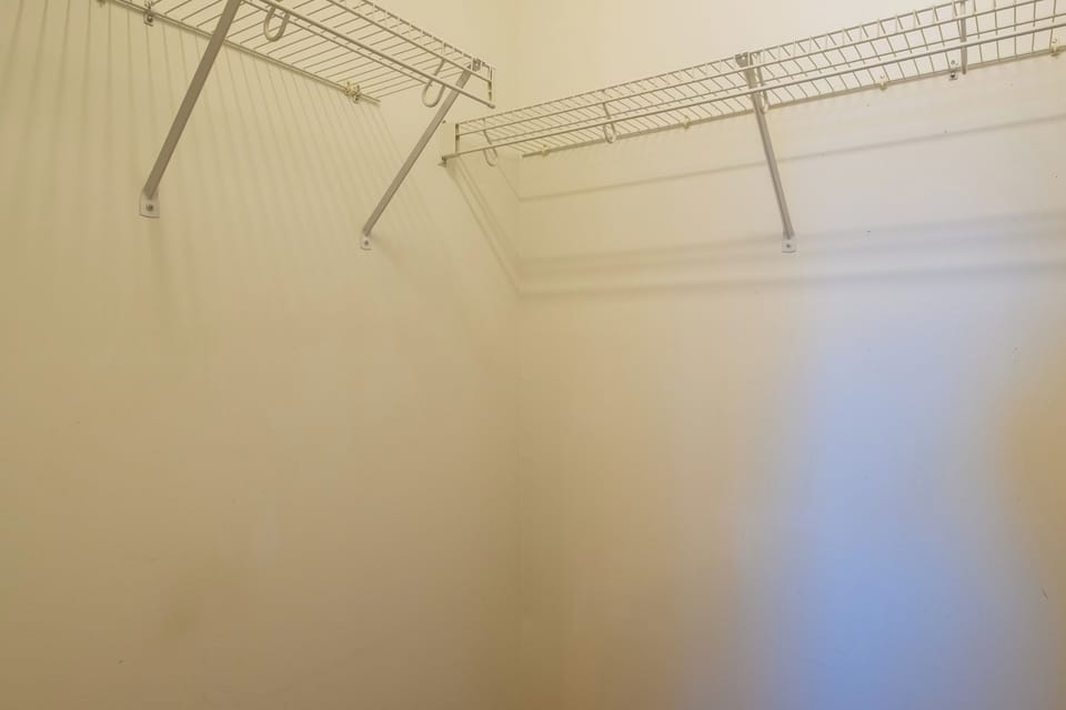 Plenty of room to unpack and stay awhile! This spacious walk-in closet ensures you can comfortably store all your luggage and gear during your vacation.
