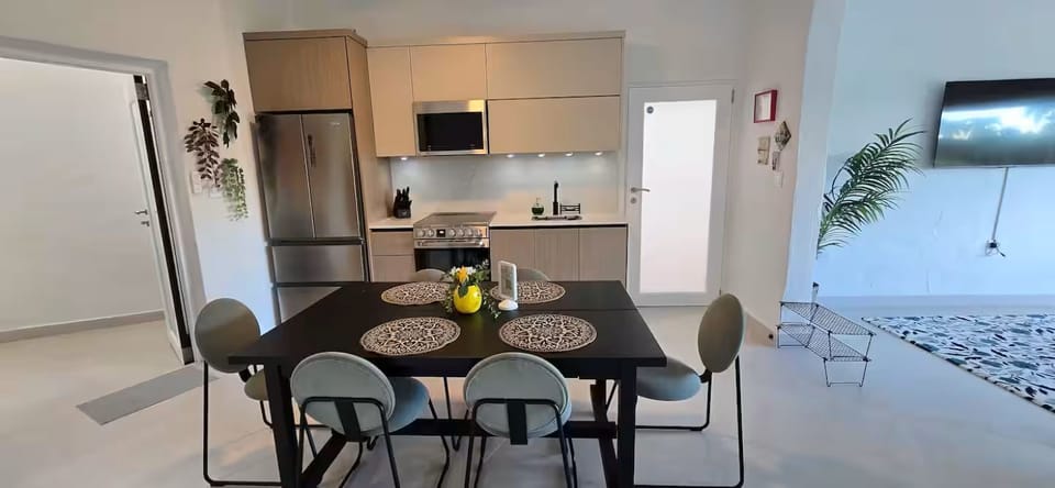 Kitchen and dining are in an open space.