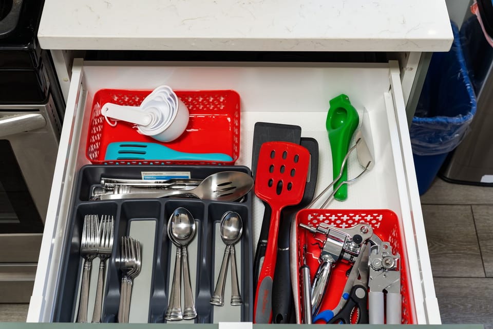 Kitchen essentials neatly arranged for stress-free cooking and cleanup.
