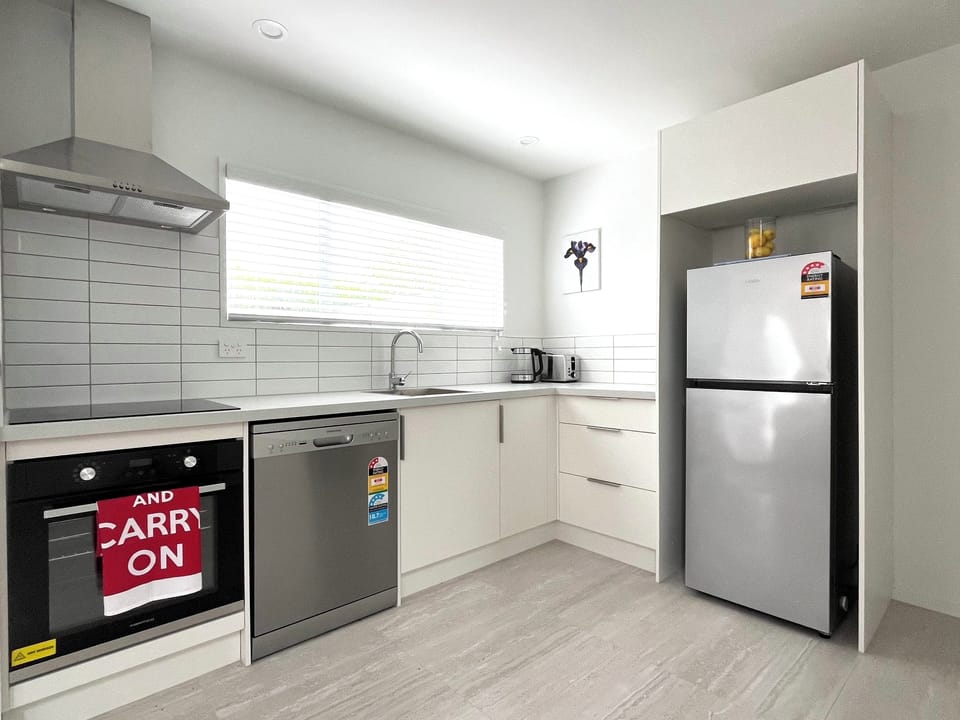 Kitchen. New whiteware. All you need for cooking (or there's a microwave). 