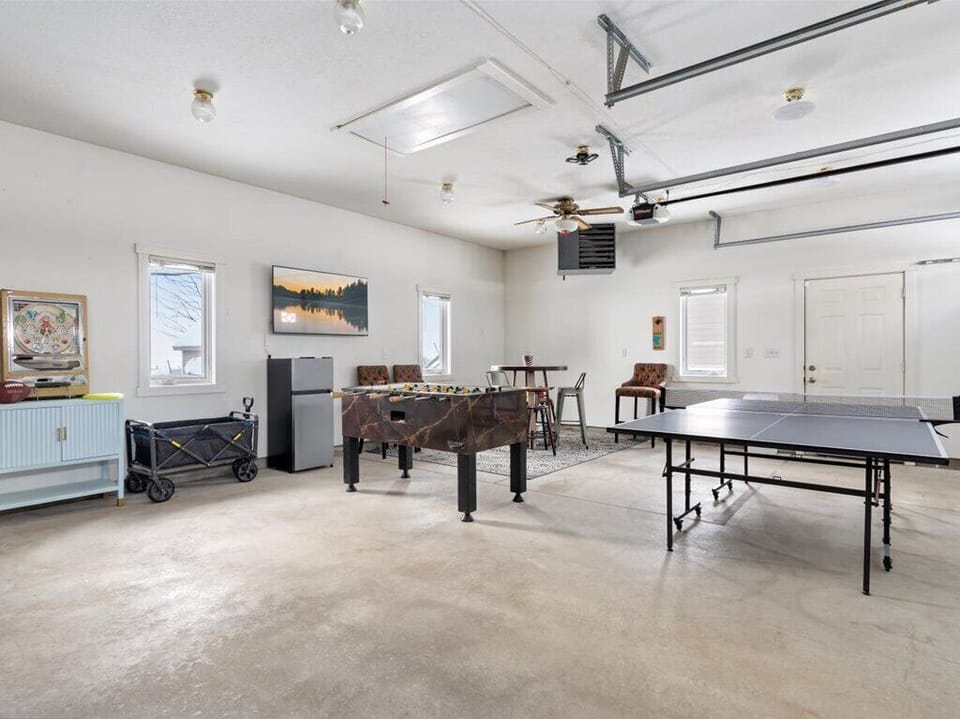 Attached & heated garage complete with games! 