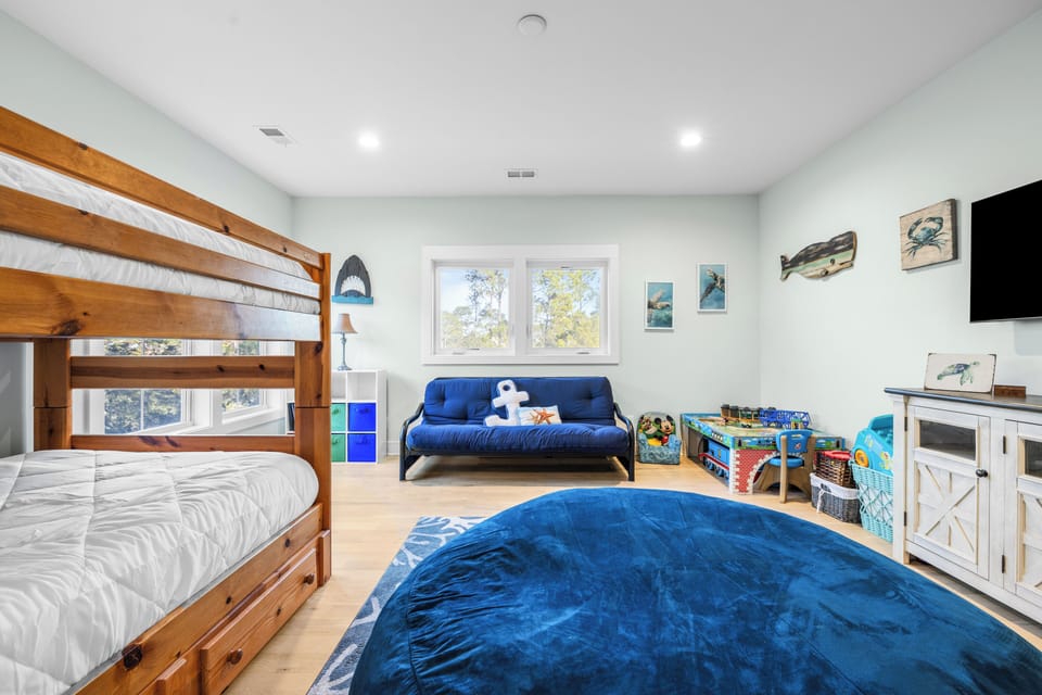 Bedroom 4 features full bunk beds and a futon.