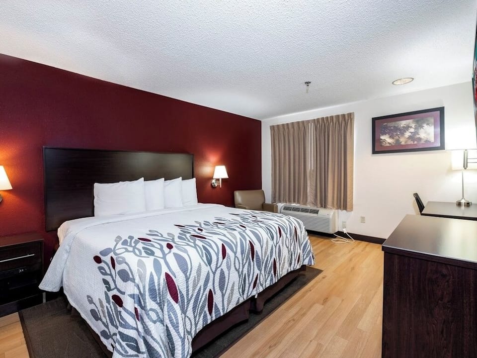 Settle into a bright, spacious room with plush king comfort.