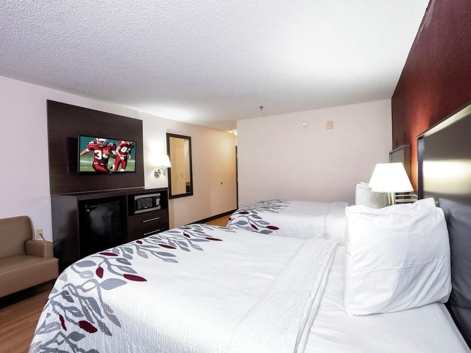 Recharge in crisp linens with convenient in-room entertainment.