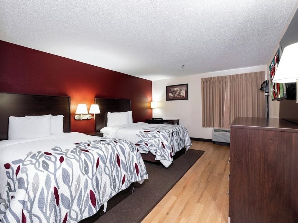 Settle into two cozy beds in a bright, spacious room.