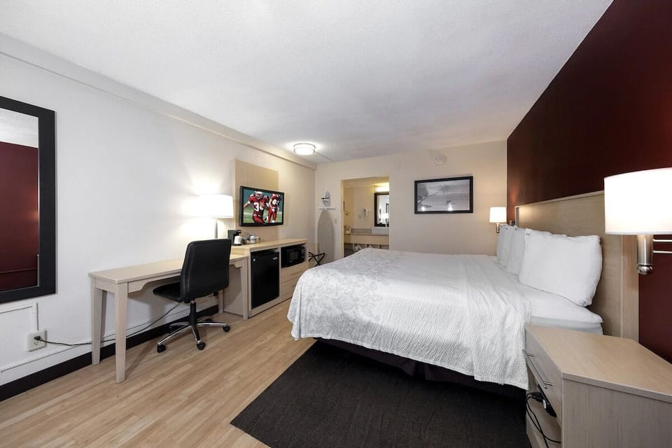 Stretch out on the plush king bed after busy days.