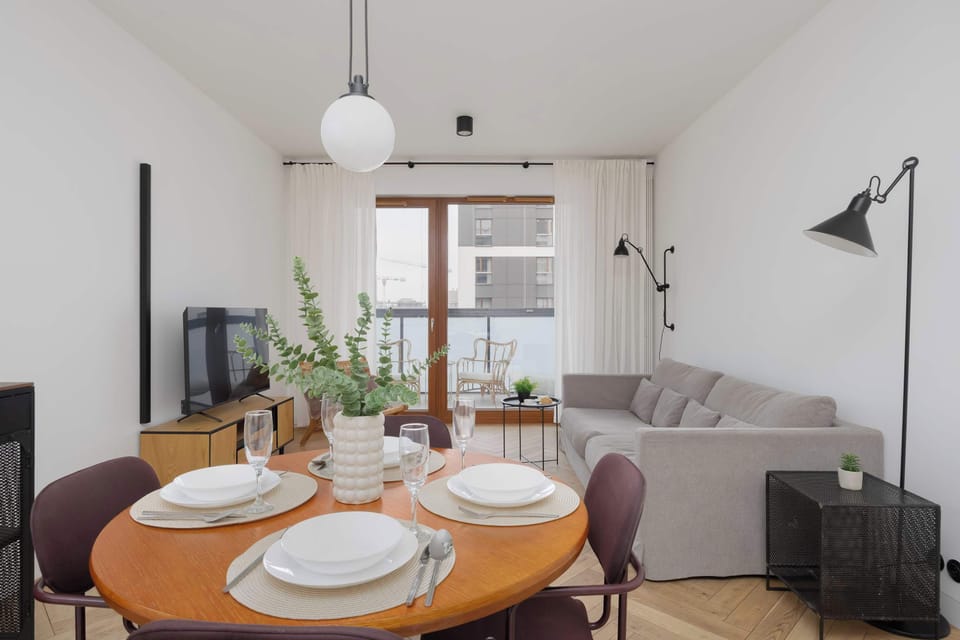 Inviting dining space with round table and natural light.