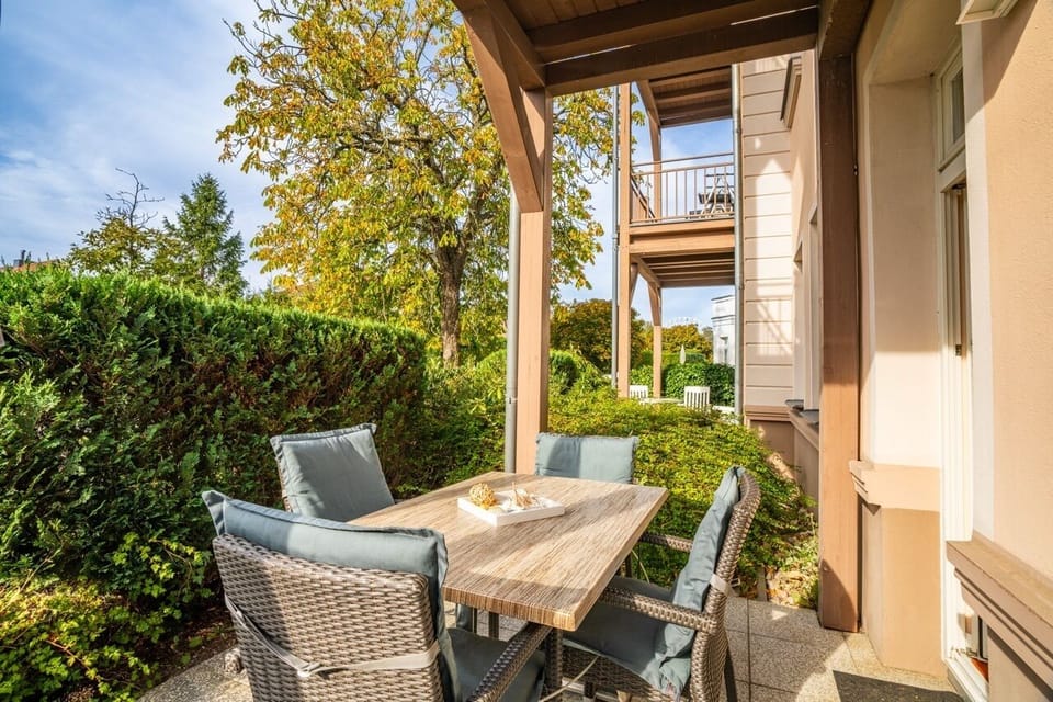 Enjoy relaxing hours on the sunny terrace with garden views.