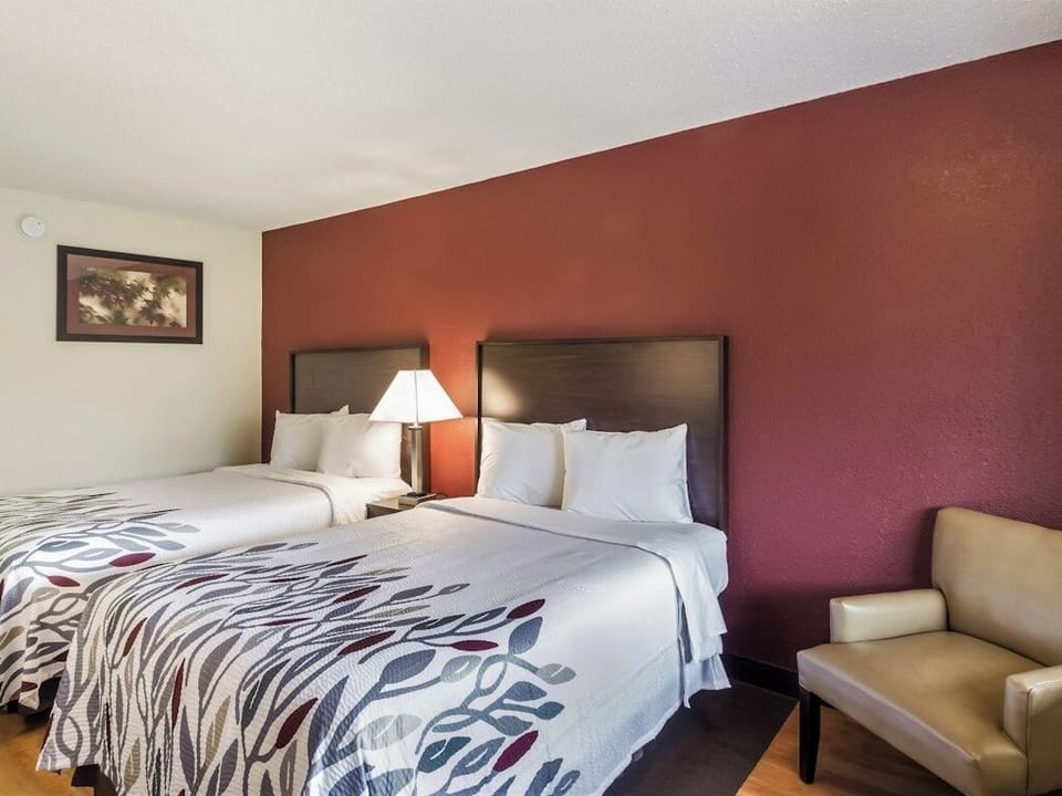 Unwind on crisp linens after a full day exploring.