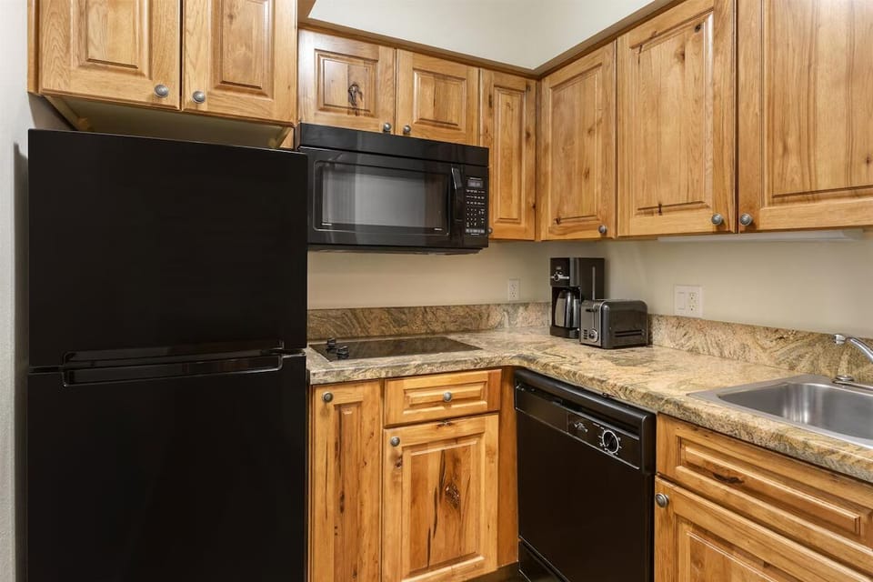 Start your morning with coffee in this convenient kitchenette.