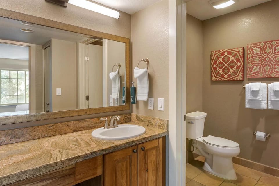 Refresh at the spacious vanity with bright, flattering lighting.
