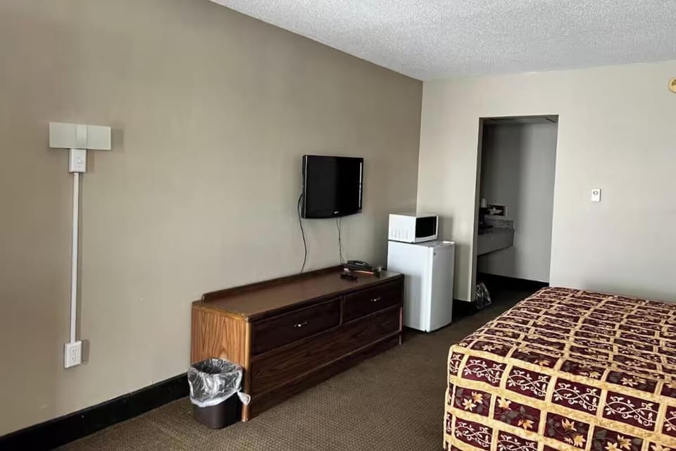 Kick back with in-room TV and convenient snack setup.