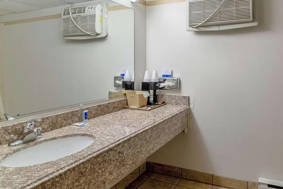 Freshen up with a wide vanity and easy-access sink.