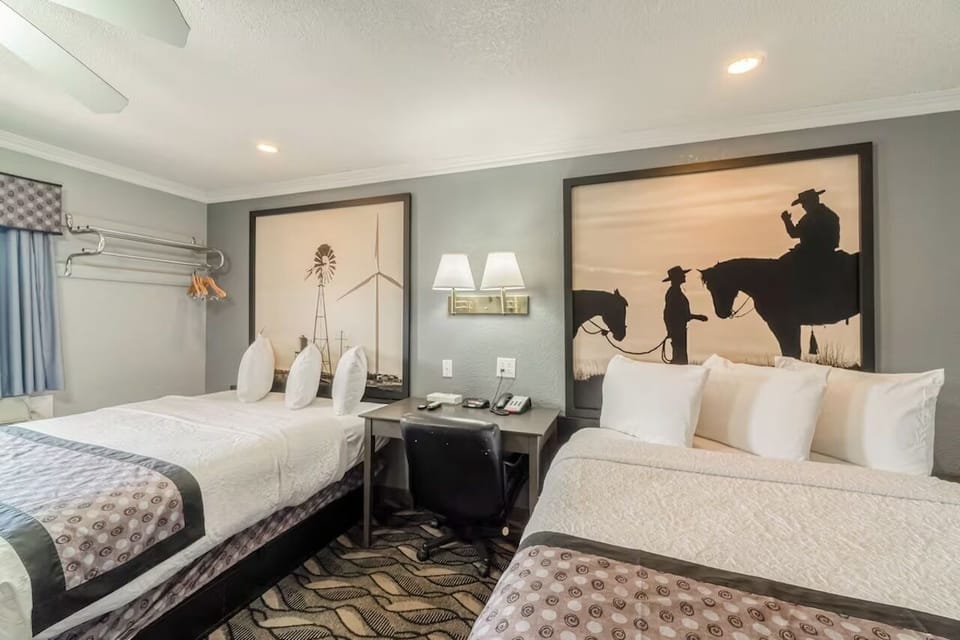 Drift off comfortably with two beds and cozy bedside lighting.