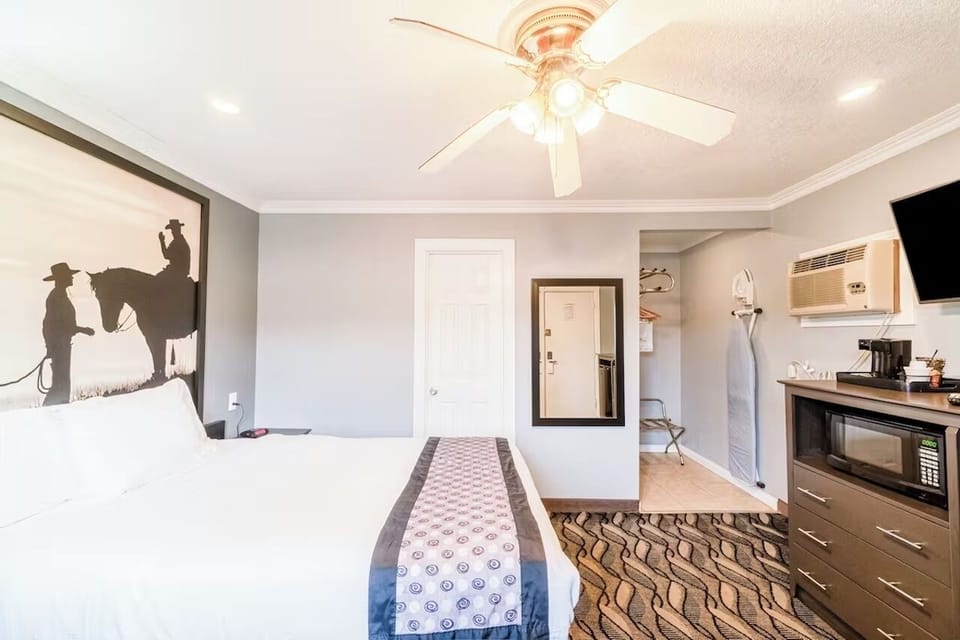 Sink into crisp bedding and enjoy a bright, airy room.