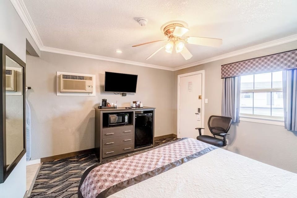 Relax into plush bedding in a bright, refreshed room.
