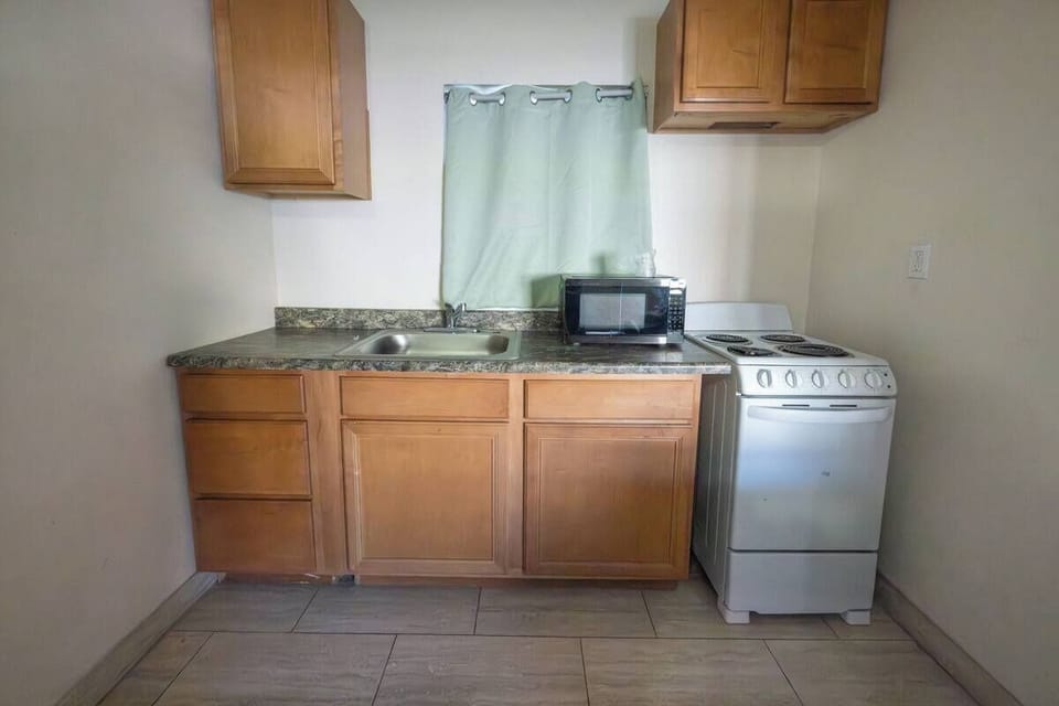 Cook simple favorites with a handy stove, sink, and microwave.