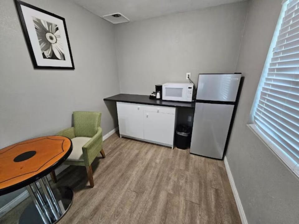 Enjoy easy snacks with mini‑fridge, microwave, and counter space.