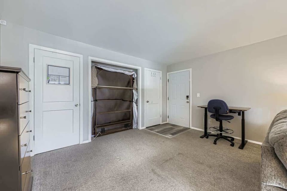 View of the front door and desk space 