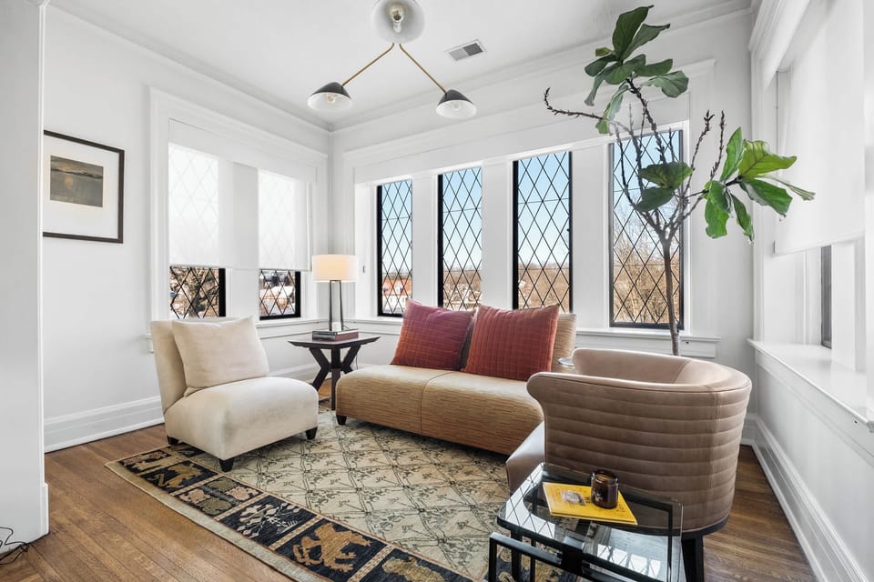 Living Room: Designed for longer stays—this bright, modern living room offers a comfortable place to work, relax, and truly settle in.