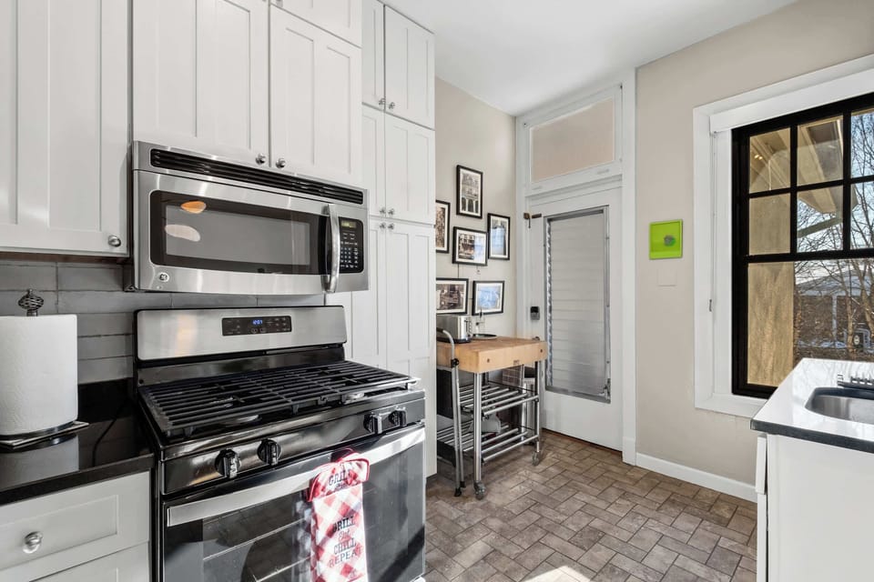 Kitchen: Whether you’re staying a few weeks or longer, this functional kitchen offers the space and tools you need to cook comfortably and consistently.