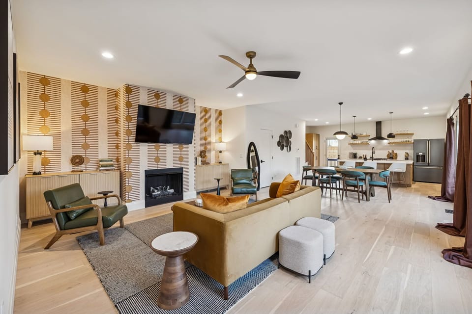 Living Room: Designed for groups who love comfort and convenience—this modern living room features a large smart TV, contemporary décor, and plenty of space to unwind together.