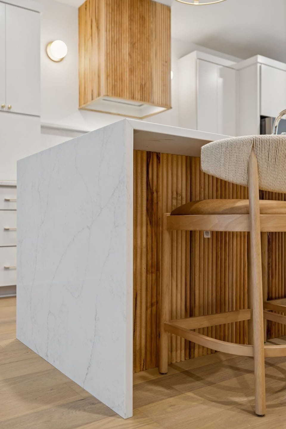 Kitchen: Sleek lines, warm tones, and high-end touches — the perfect kitchen for cooking, entertaining, and enjoying life together.