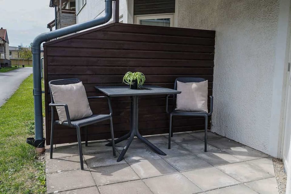 A view of the apartment's private outdoor seating area.