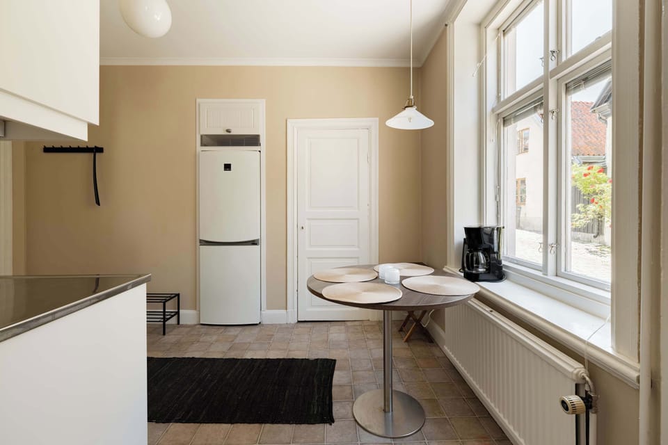 Another view of the kitchen (chairs have been delivered after picture was taken).