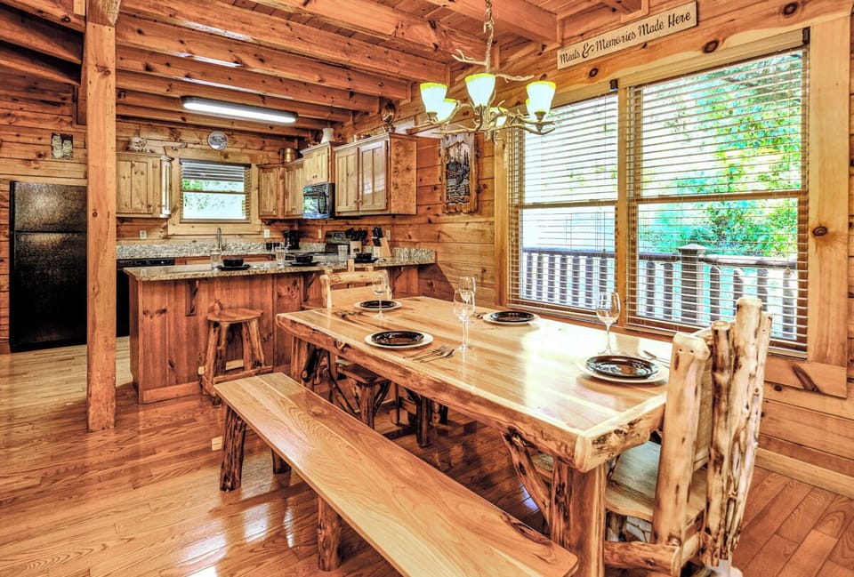 Whether you're enjoying a meal around the rustic dining room table or whipping up a family style meal, this cabin is made for time together.