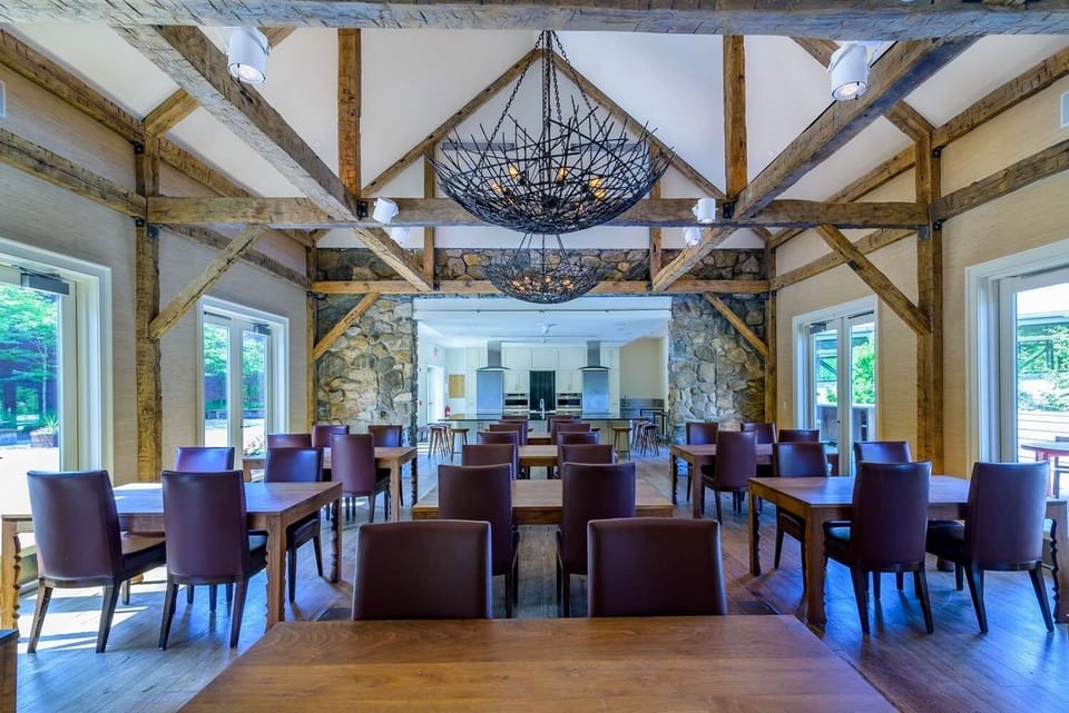 Savor lively meals under rustic beams and glowing chandeliers.