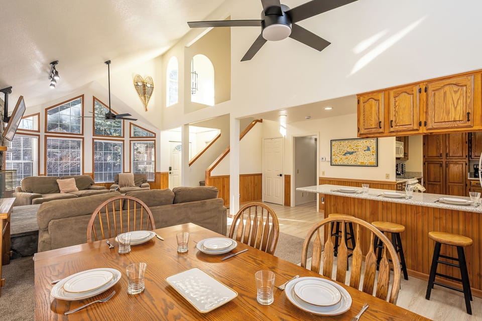 Whether gathered around the dining table or hanging out in the living room, create great memories in this bright and light open-concept space.