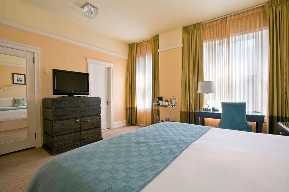 Comfortable king room with modern amenities, stylish decor, and a cozy atmosphere for a relaxing stay.