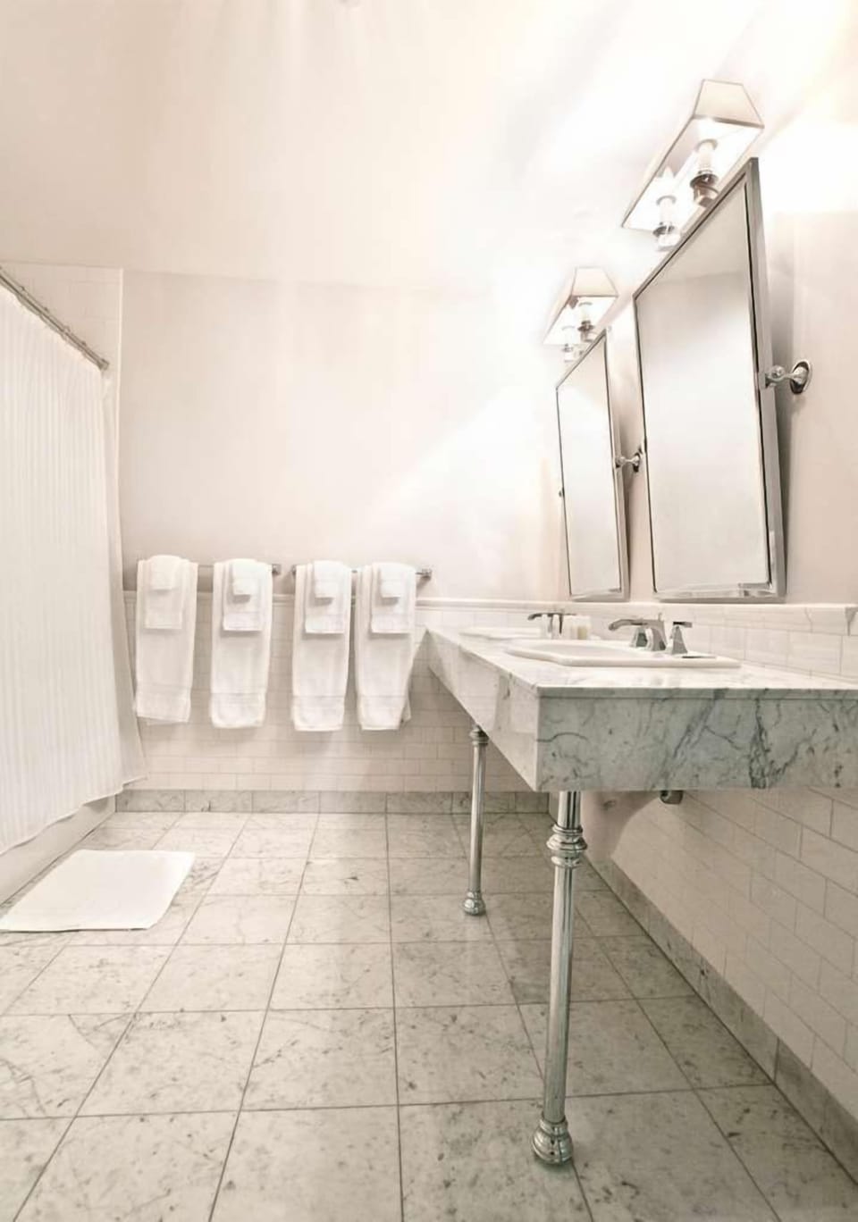 Our accessible bathroom is equipped with a roll-in shower, providing convenience and comfort for all guests.