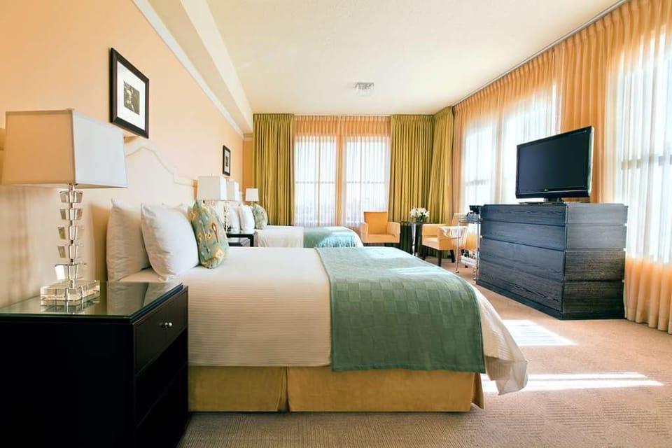 Our double queen room offers ample space and comfort, perfect for families or friends traveling together.