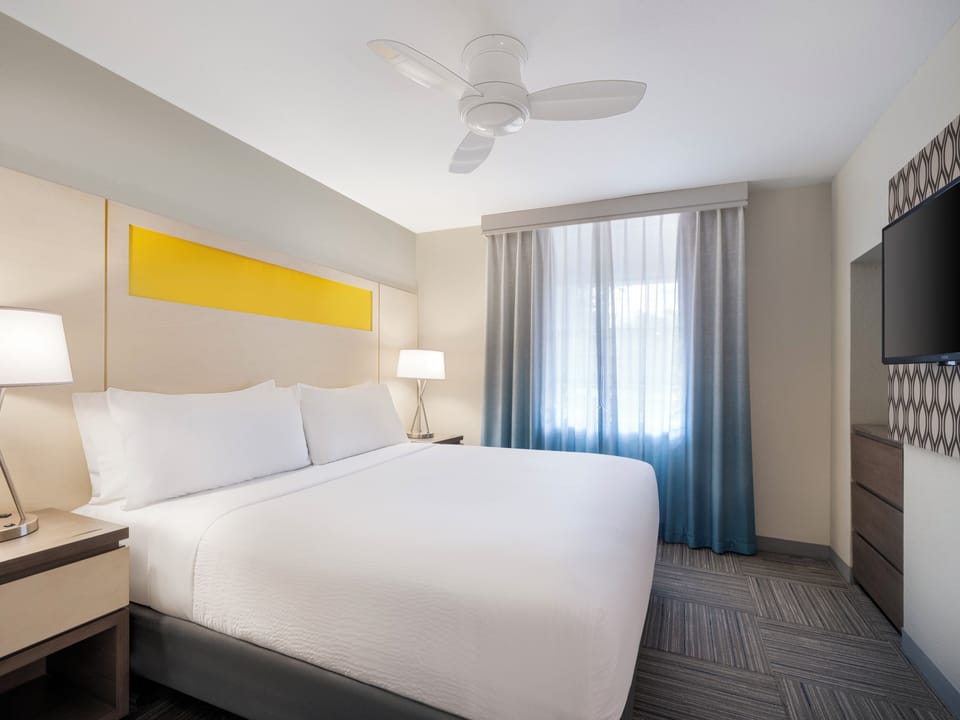 Sink into crisp linens and enjoy a peaceful night’s rest.