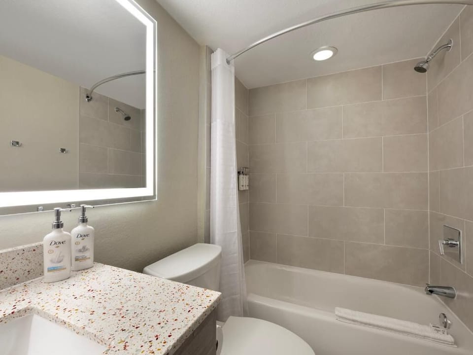 Rinse off comfortably in the clean, modern shower-tub combo.