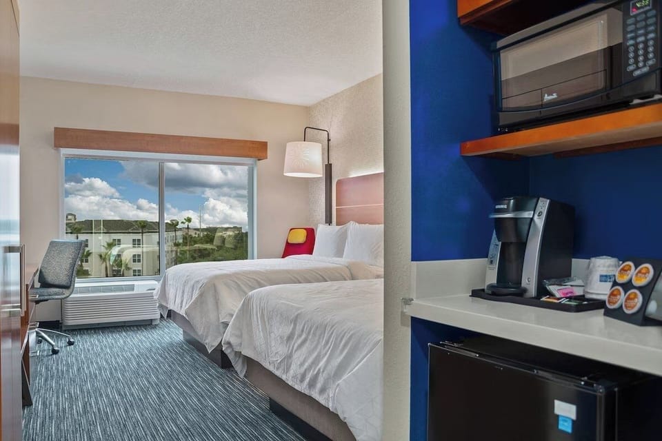 Recharge with in-room coffee and snacks anytime you like.