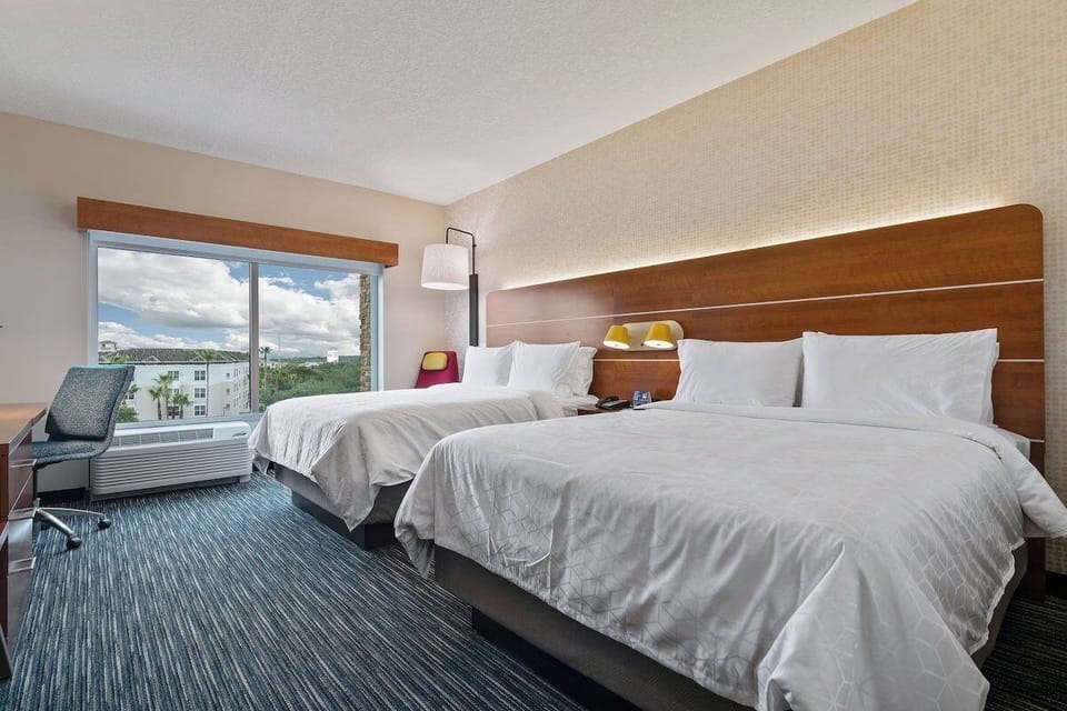 Unwind in crisp linens with calming views by day.