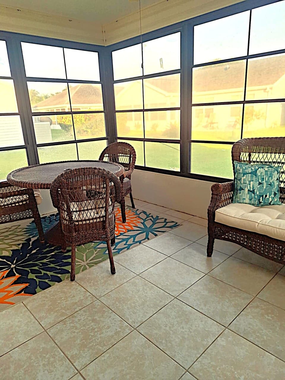 Enjoy time sitting in the lanai with comfortable seating.