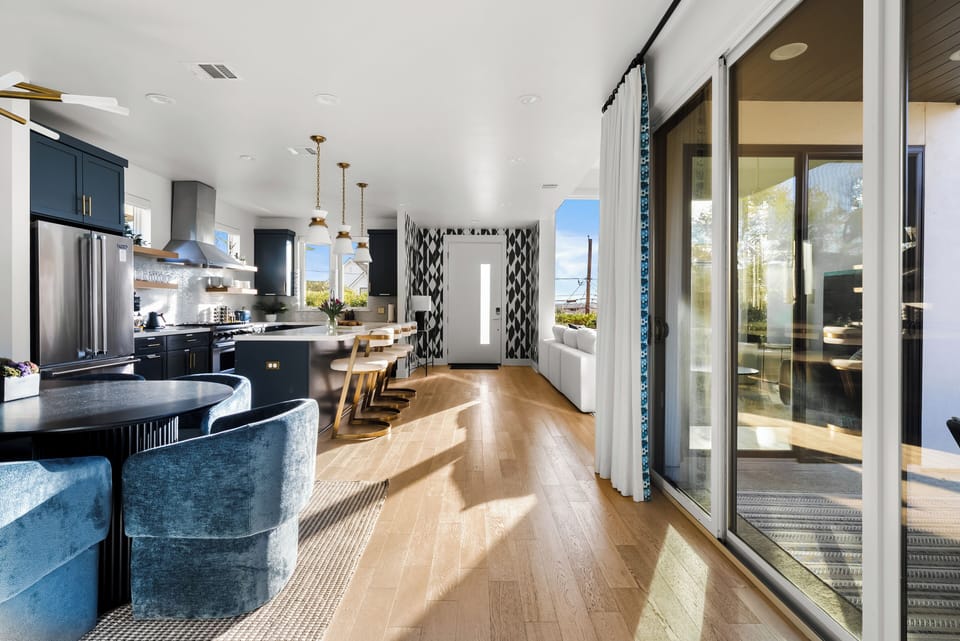 Open-concept living: seamless flow between kitchen, dining, and lounge areas.